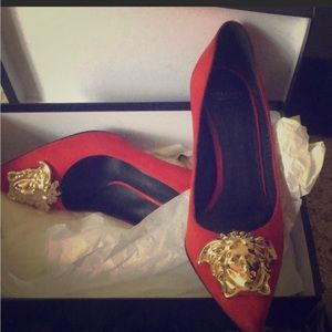 Red and gold Versace heel not worn very much very beautiful shoe